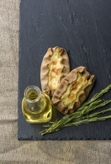 Potato pies with olive oil and rosemary