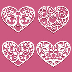 Fototapeta na wymiar Set of laser cut hearts. Collection stencil lacy hearts with carved openwork pattern. Template for layouts wedding cards, invitations. Vector floral heart