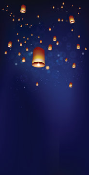 Floating lanterns in the night sky ceremony at Thailand