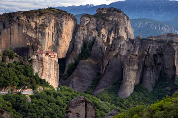 Monastery on top of a rock in the Meteora mountain landscape in Greece 
