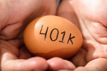 Human Hand With Egg With 401K Pension Text
