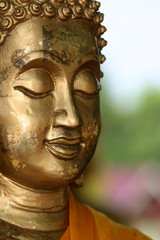 A peaceful face at a temple in Singburi, Thailand
