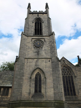 the church of saint johns in leeds a seventeenth century church showing the tower, clock and windows