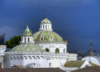 Old church domes in downtown Quito, on a rainy afternoon. Quito, Ecuador