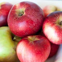 Fototapeta na wymiar Close up of organic red green apples. Square crop