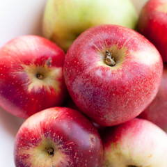 Fototapeta na wymiar Close up of organic red green apples. Square crop