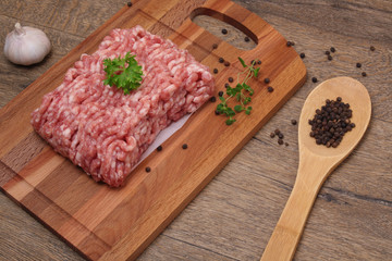 Raw minced meat with pepper, garlic