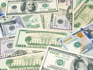 Background of the american dollars bills. Various USD dollar notes.