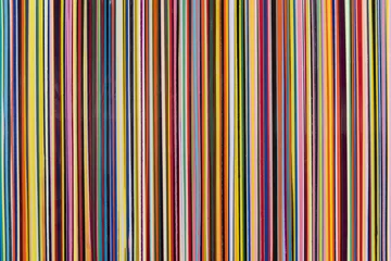 Fotobehang Verticale strepen Verticale strepen van verschillende kleuren dunne breedte met textuur.