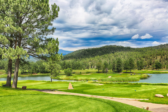 Mountain resort, golf courses. HDR image.