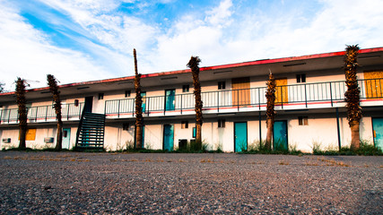 abandoned motel on the road - obrazy, fototapety, plakaty