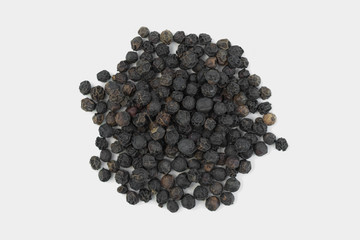 Peppercorns white background