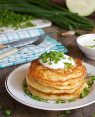 Fritters of zucchini. Zucchini Pancakes
