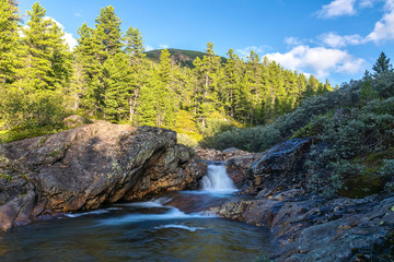 Waterfall on the Kamenka River in the Khamar-Daban Mountains