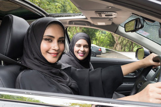 Arabic Woman Couple Traveling By Car.