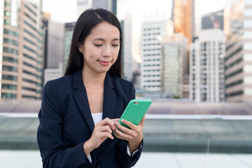 Fototapeta premium Businesswoman use of mobile phone