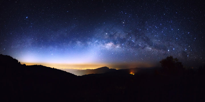 Panorama Milky Way Galaxy with light city at Doi inthanon Chiang mai, Thailand