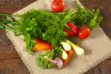Fresh vegetables on a wooden table. Healthy food. Diet
