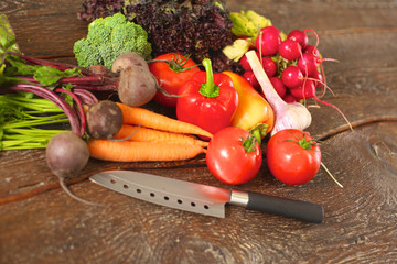 Fresh vegetables on a wooden table. Healthy food. Diet