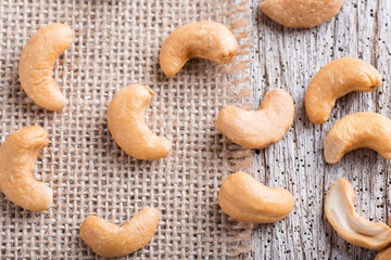 Roasted cashew nuts on rustic wood