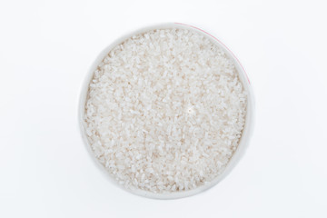 Fototapeta na wymiar white rice, natural long rice grain for background and texture on white background