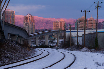 Empty rail in city while colorful sunset in winter © Martin Hossa