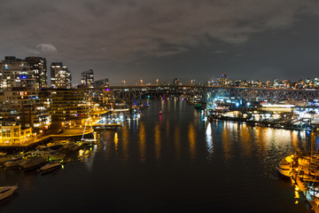 Fototapeta na wymiar Night long exposure city shot with city lights and port