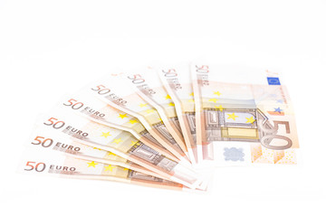 Half circle made with banknotes 50 euro european money on white background