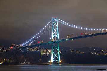 Night long exposure shot of bridge with glowing lights