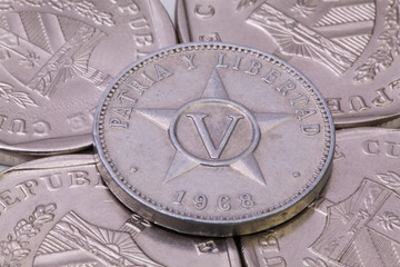 Fototapeta na wymiar Cuban pesos coins on the table.