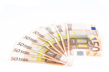 Half circle made with banknotes 50 euro european money on white background