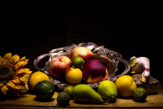 summer fruits with sunflower in light painting