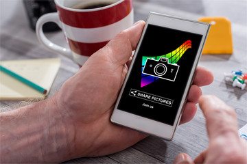 Pictures sharing concept on a smartphone