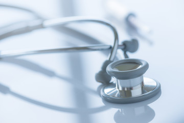 Stethoscope with reflection for medical background