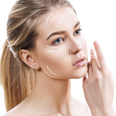 Beautiful woman face with massaging arrows on face