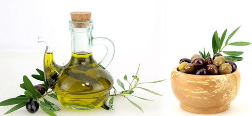 Olive oil and olives on white background