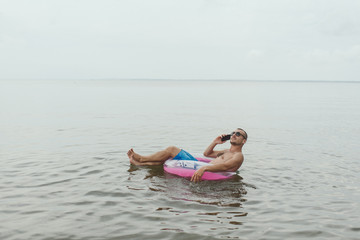 The gone tourist with the mobile phone