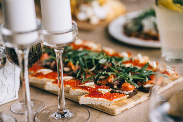 catering services background with snacks and food on plate in restaurant