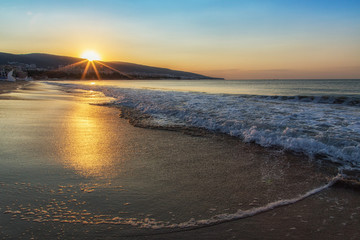 Naklejka premium Sunrise at Sunny beach, Bulgaria, Europe. Beautiful sunrise at the beach.