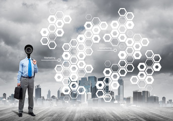 Camera headed man standing on wooden floor against modern cityscape