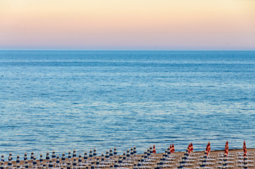 The Black Sea shore from Albena, Bulgaria with golden sands, blue fresh water, sunbeds and...