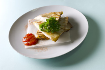 Quesadilla with chicken and cheddar cheese with sauce