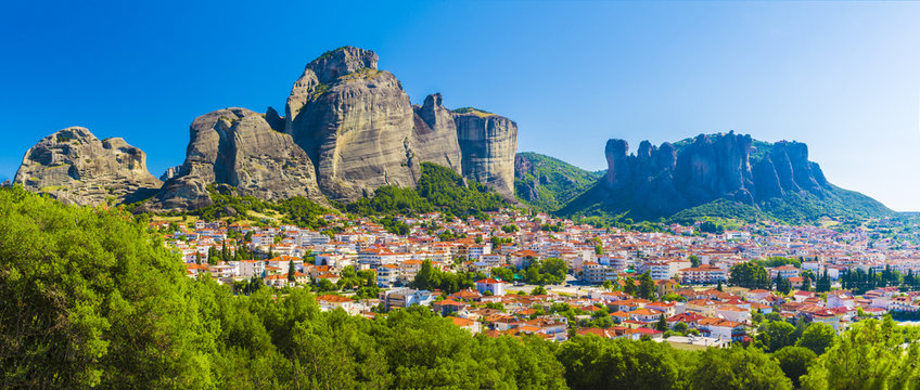 Kalampaka town with Metora cliffs and monastery, Greece.