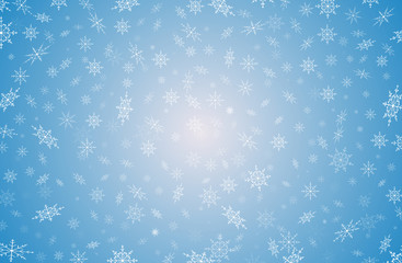 красивый зимний фон из белых снежинок на синем фоне       