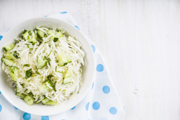 Salad with kohlrabi, cucumber and dill.