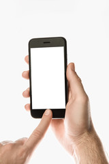 Hand holding Black Smartphone with blank screen on white background