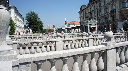 Fototapeta na wymiar Triple Bridge (3 bridges) across Ljubljanica, Ljubljana, Slovenia