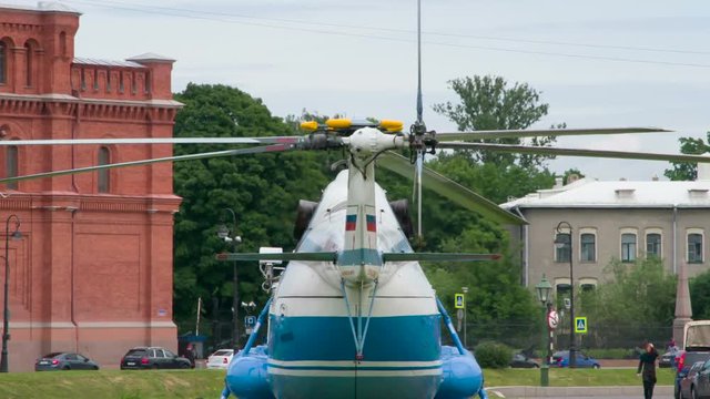 Helicopter on City Background