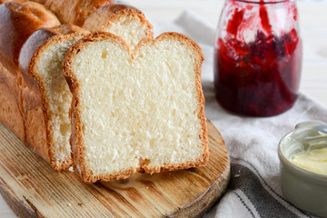 Homemade brioche with jam. Fresh brioche bread.