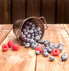 Healthy mixed fruit, Blueberry. Fresh berries , blackberry, raspberry, on wooden table